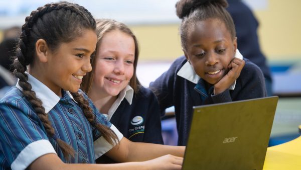 Primary Students on laptop