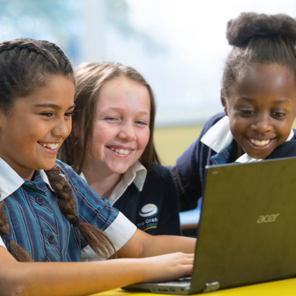 Primary Students on laptop